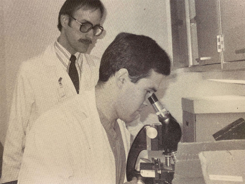 Clay Marsh as a third-year medical student at WVU reviewing specimens in the lab.