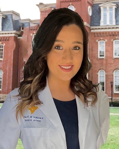 Kandice is shown as she wears her WVU Dental Hygene white coat. Her image is superimposed onto a view in front of Woodburn Hall.